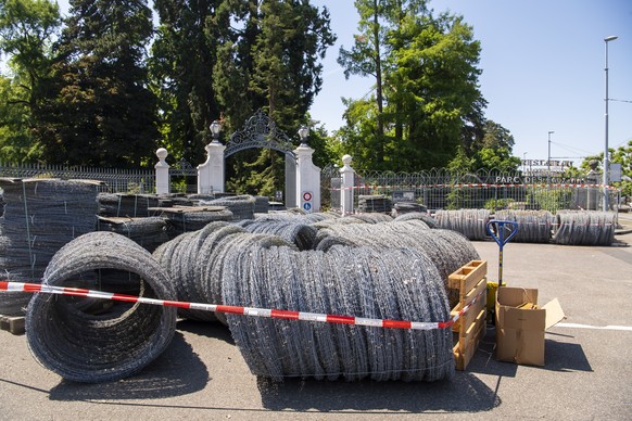 epa09259685 Barbed wire and fences were installed outside the Parc La Grange aux Eaux-Vives in Geneva, Switzerland, 10 June 2021. The Villa La Grange is the confirmed location of the meeting between t ...