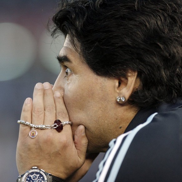 epa01893868 Argentinean head coach Diego Maradona reacts during the South Africa 2010 World Championship qualifying soccer match between Argentina and Peru at Monumental Stadium in Buenos Aires, Argen ...
