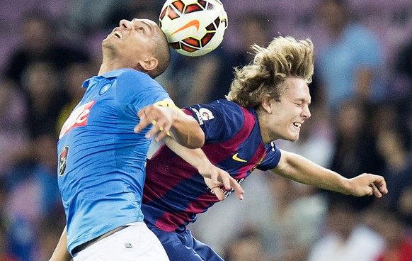 Napoli&#039;s Goekhan Inler of Switzerland, left, in action against FC Barcelona&#039;s Alen Halilovic, right, during a friendly soccer match between Spain&#039;s FC Barcelona and Italy&#039;s SSC Nap ...
