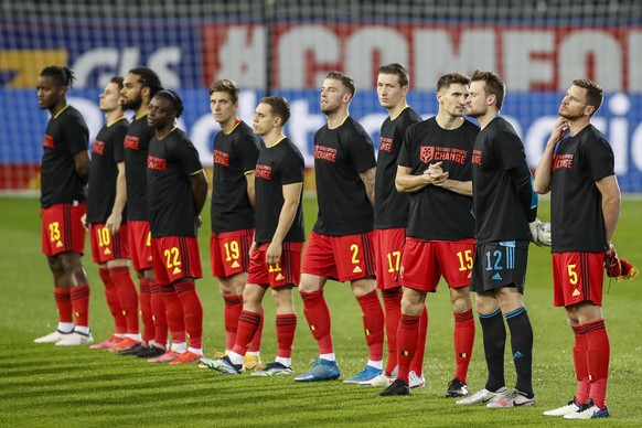 Belgium players wear a t-shirt reading: &quot;Football supports change&quot; prior of the World Cup 2022 group E qualifying soccer match between Belgium and Belarus at the King Power stadium in Leuven ...