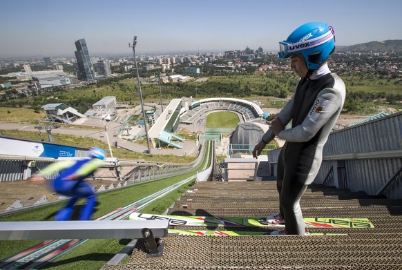 Members of Kazakhstan&#039;s national team attend training session at the Sunkar Ski Jumping complex in Almaty, Kazakhstan, July 15, 2015. Kazakhstan is aspiring to host the 2022 Winter Olympics but m ...