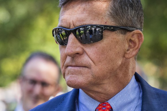 FILE - In this Sept. 10, 2019, file photo Michael Flynn, President Donald Trump&#039;s former national security adviser, leaves the federal court following a status conference with Judge Emmet Sulliva ...