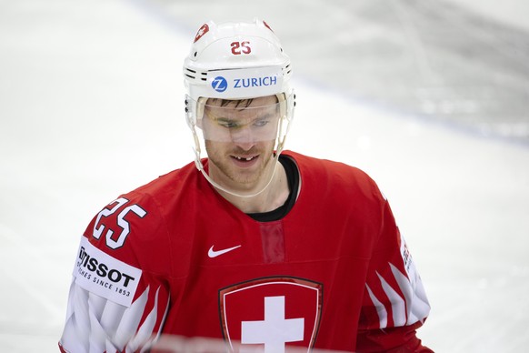 Switzerland&#039;s defender Mirco Mueller looks his teammates, during the IIHF 2021 World Championship preliminary round game between Switzerland and Great Britain, at the Olympic Sports Center, in Ri ...