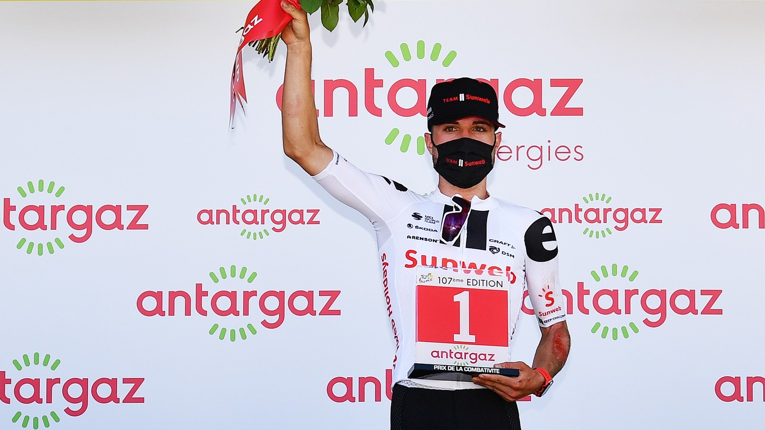 epa08676596 Swiss cyclist Marcel Hirschi of Team Sunweb receive the most combative rider award after the 18th stage of the Tour de France over 175km from Meribel to La Roche-sur-Foron, France, 17 Sept ...