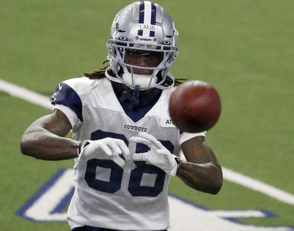 Dallas Cowboys wide receiver CeeDee Lamb (88) makes a reception during an NFL football training camp in Frisco, Texas, Sunday, Sept. 23, 2020. (AP Photo/Michael Ainsworth)