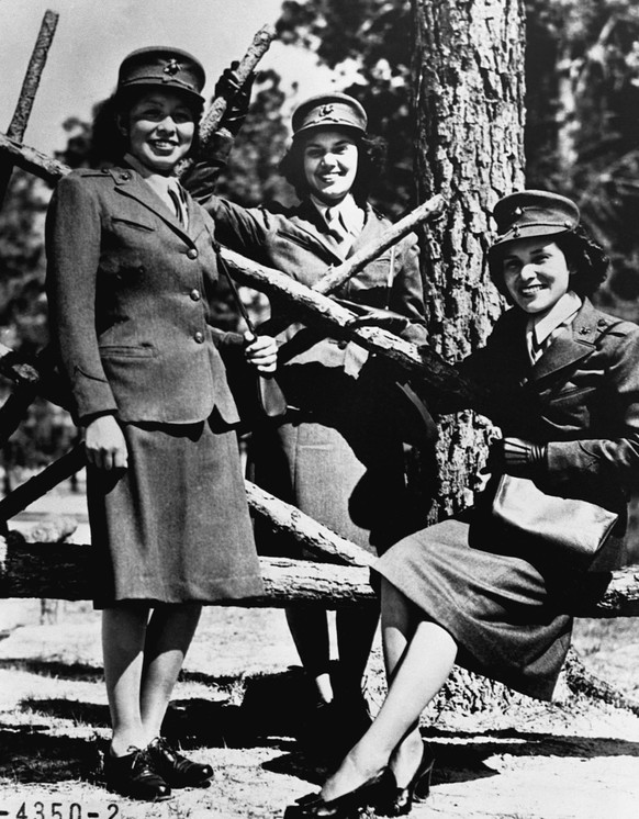 Three Marine Corps women reservists, Camp Lejeune, North Carolina. (l to r) Minnie Spotted Wolf (Blackfoot), Celia Mix (Potawatomi), and Viola Eastman (Chippewa). October 16, 1943. (Photo by © CORBIS/ ...