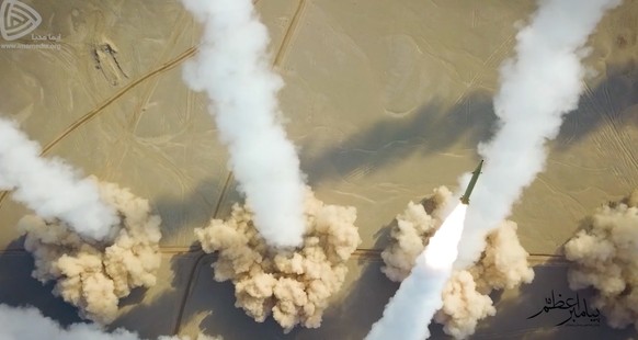 In this photo released Friday, Jan. 15, 2021, by the Imamedia missiles are launched during a drill. Iran&#039;s paramilitary Revolutionary Guard forces on Friday held a military exercise involving bal ...