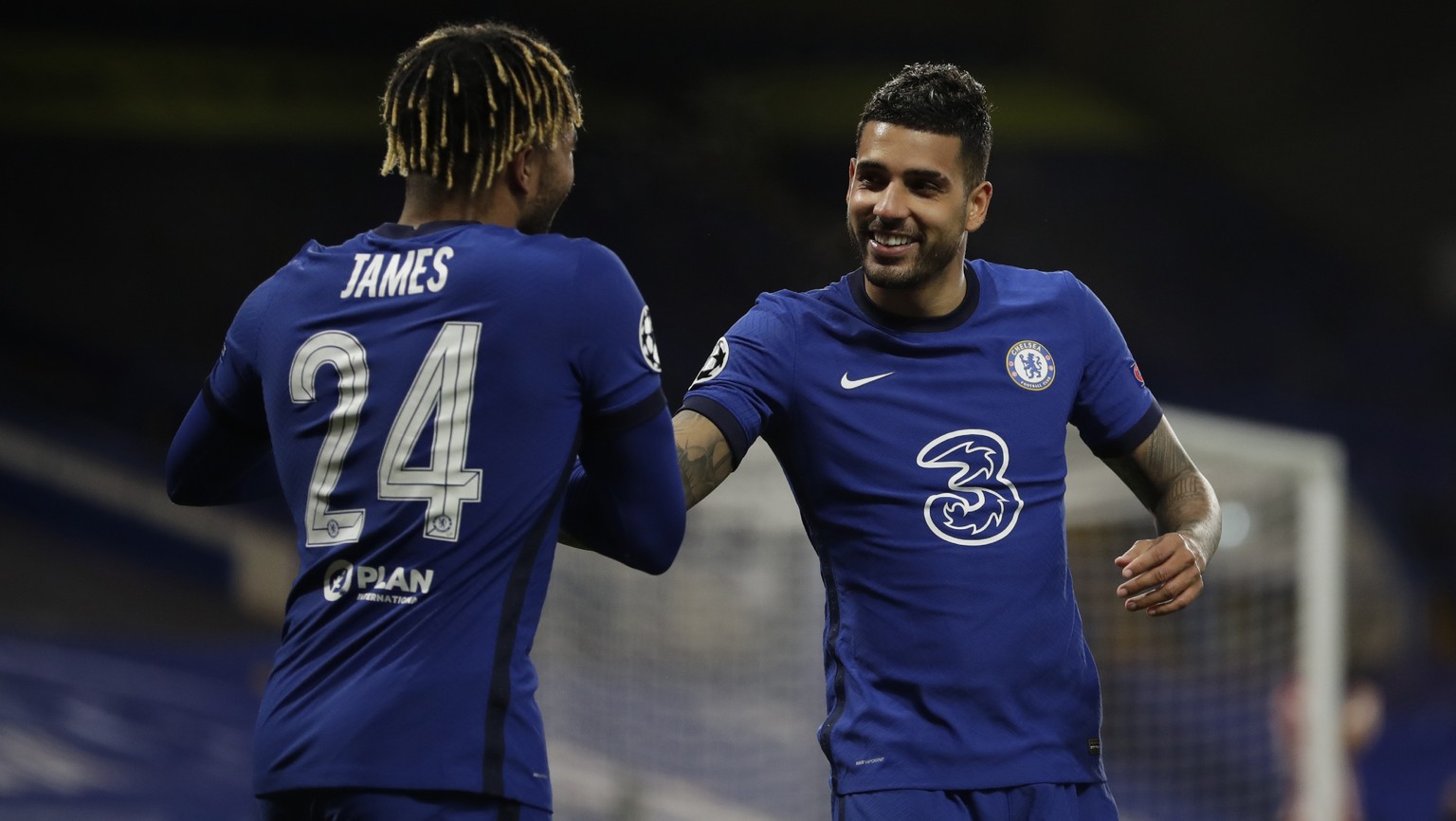 Chelsea&#039;s Emerson Palmieri, right, celebrates after scoring his side&#039;s second goal during the Champions League, round of 16, second leg soccer match between Chelsea and Atletico Madrid at th ...
