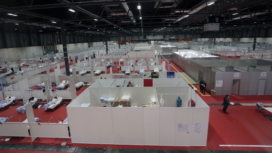 A general view a temporary field hospital set at Ifema convention and exhibition of in Madrid, Spain, Thursday, April 2, 2020. The new coronavirus causes mild or moderate symptoms for most people, but ...