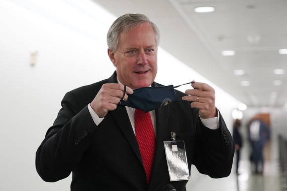 White House Chief of Staff Mark Meadows speaks to the media as he walks out during a break in the confirmation hearing for Supreme Court nominee Amy Coney Barrett before the Senate Judiciary Committee ...
