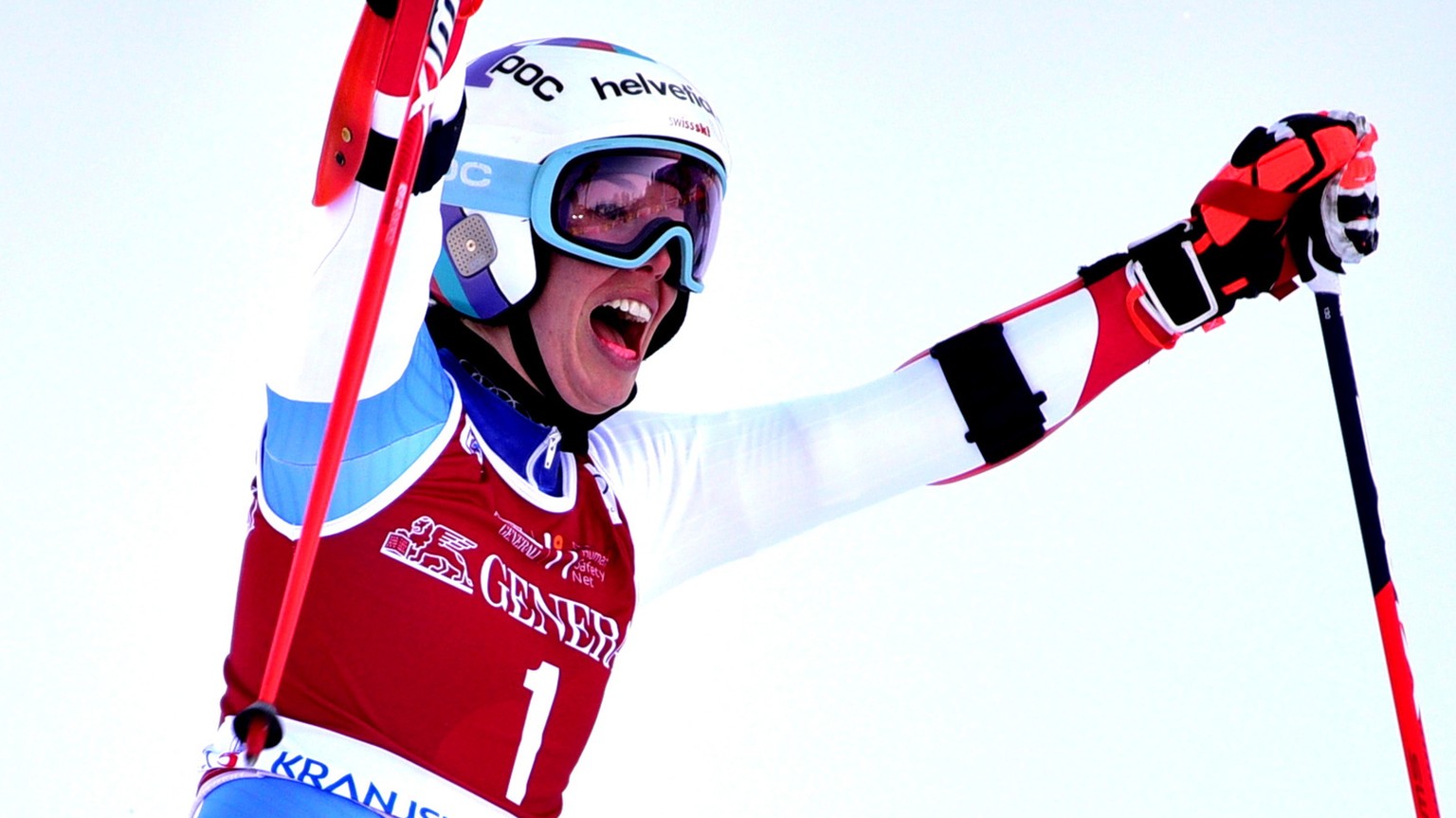 epa08941688 Michelle Gisin of Switzerland celebrates after taking the third place in the women&#039;s Giant Slalom race of the FIS Alpine Skiing World Cup in Kranjska Gora, Slovenia, 16 January 2021.  ...