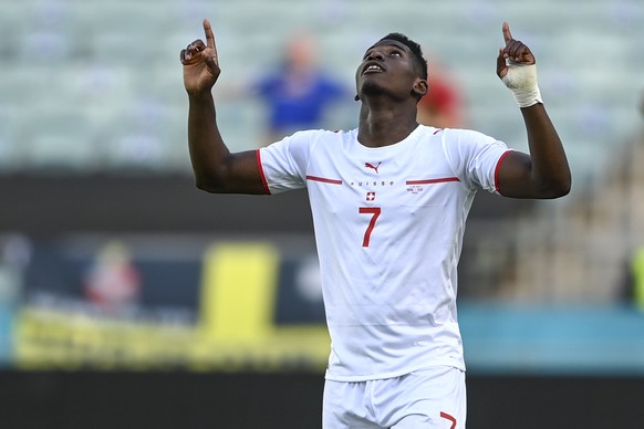 Switzerland&#039;s Breel Embolo celebrates after scoring his side&#039;s opening goal during the Euro 2020 soccer championship group A match between Wales and Switzerland, at the Baku Olympic stadium, ...