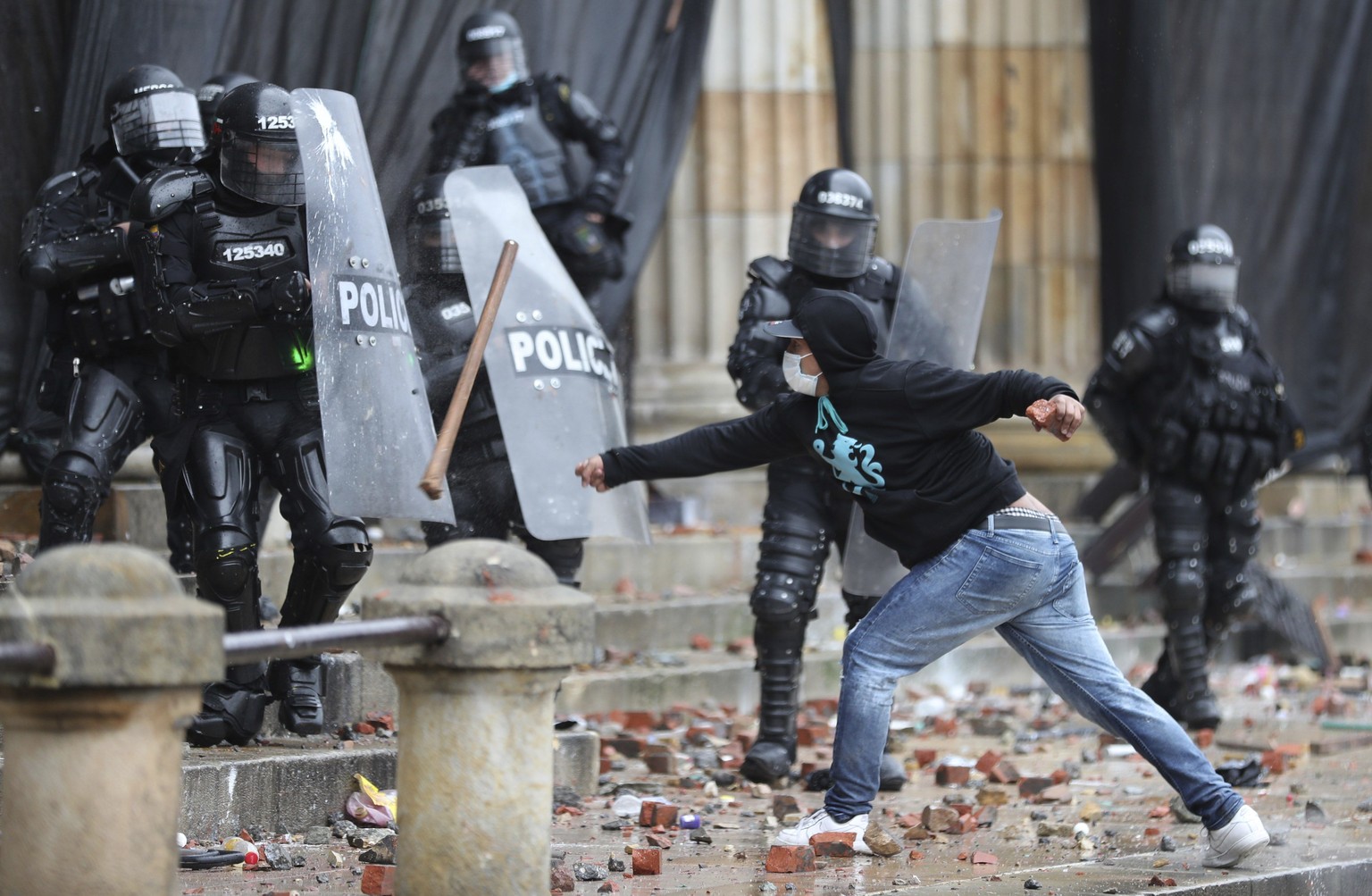 An anti-government protester clashes with police in Bogota, Colombia, Wednesday, May 5, 2021. The protests that began last week over a tax reform proposal continue despite President Ivan Duque&#039;s  ...