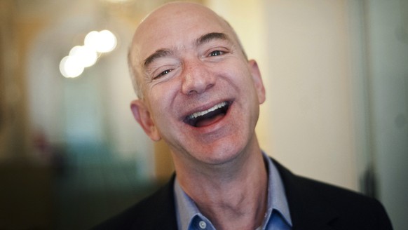 epa07353115 (FILE) - US entrepreneur, founder and president of internet company Amazon, Jeff Bezos smiles at the Bayerischer Hof in Munich, Germany, 11 October 2012 (reissued on 08 February 2019). Acc ...
