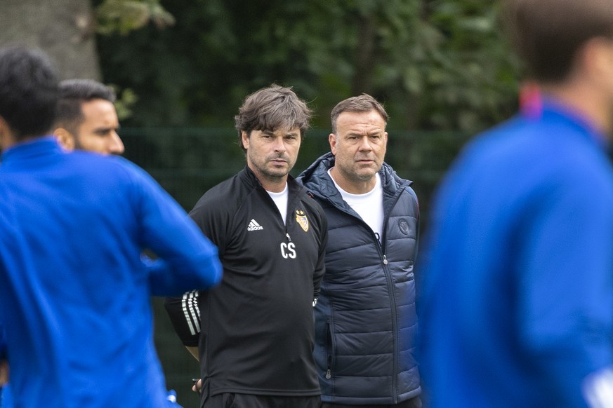 FC Basel&#039;s head coach Ciriaco Sforza, left, and assistant coach Patrick Rahmen, right, during a training session the day before the UEFA Europa League third qualifying round soccer match between  ...