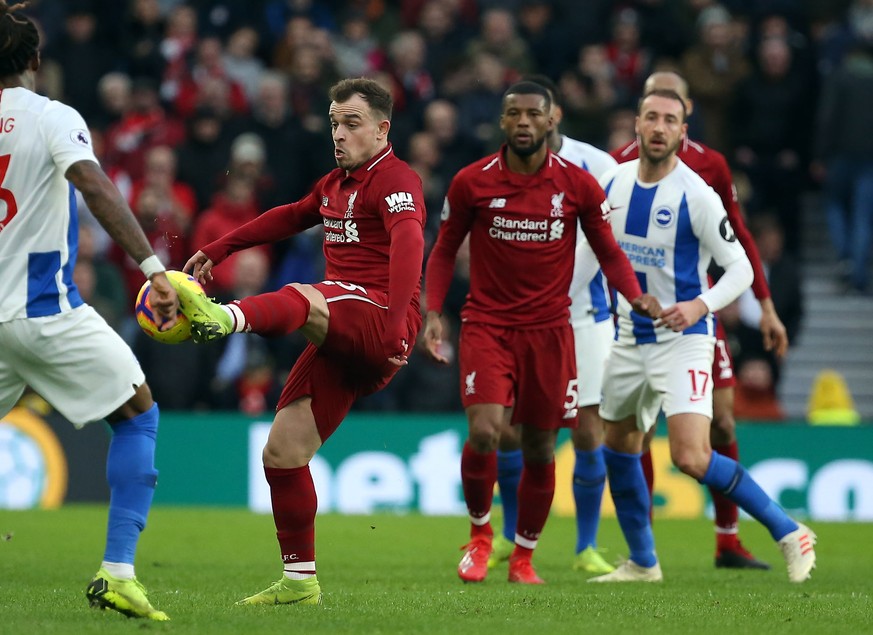 epa07278031 Liverpool&#039;s Xherdan Shaqiri (CL) during the English Premier League soccer match between Brighton Hove Albion and Liverpool at the Amex Stadium in Brighton, Britain, 12 January 2019. E ...