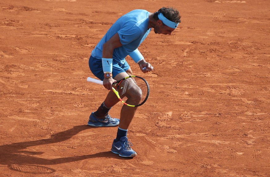 Spain&#039;s Rafael Nadal reacts as he defeats Argentina&#039;s Juan Martin Del Potro during their semifinal match of the French Open tennis tournament at the Roland Garros stadium, Friday, June 8, 20 ...