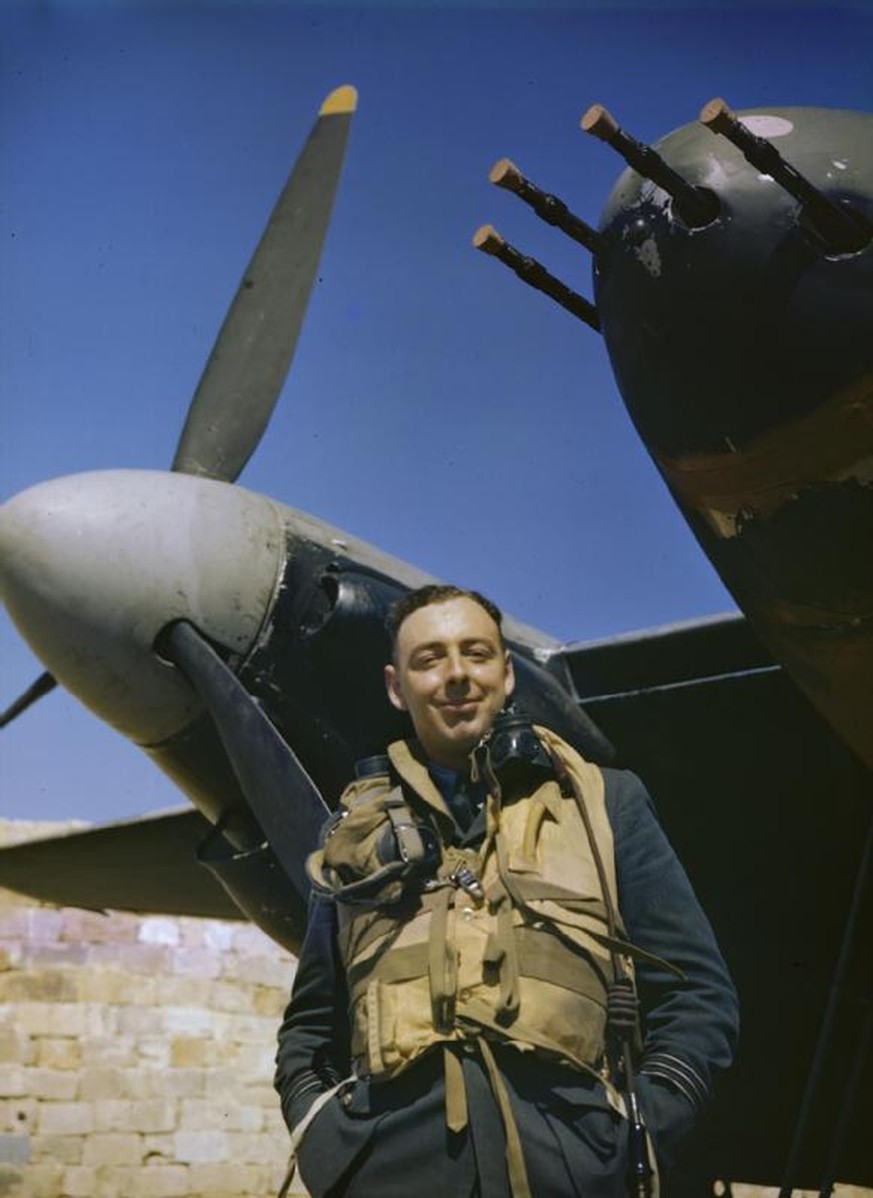 The Royal Air Force in Malta, June 1943
The Commander of No 23 Squadron, Royal Air Force, Wing Commander John B Selby, DSO, DFC, framed against the nose and engine of his De Havilland Mosquito II airc ...