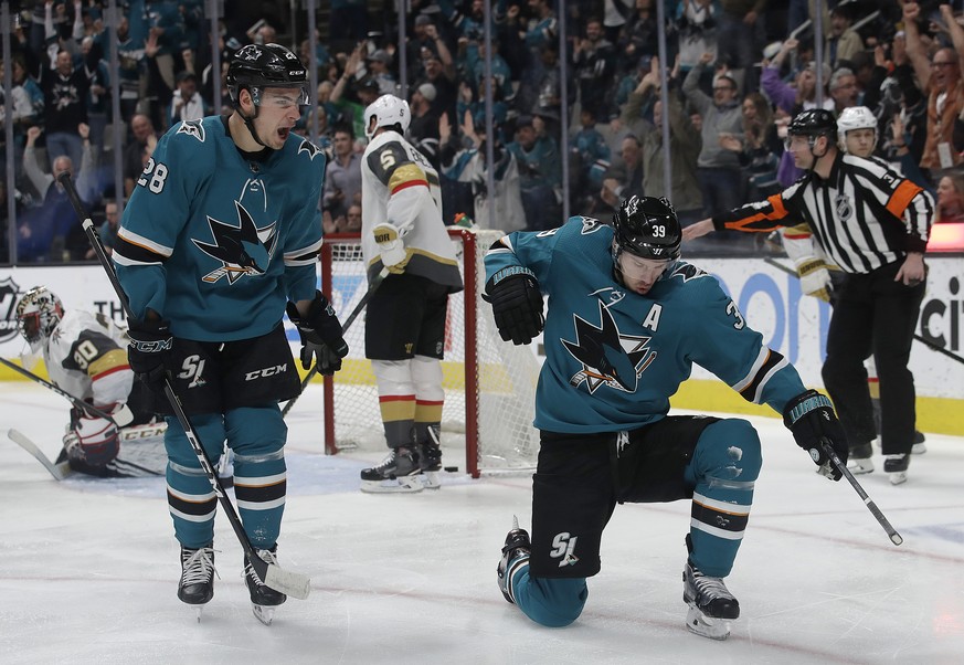 San Jose Sharks center Logan Couture, right, celebrates with right wing Timo Meier (28) after scoring a goal against the Vegas Golden Knights during the first period of an NHL hockey game in San Jose, ...