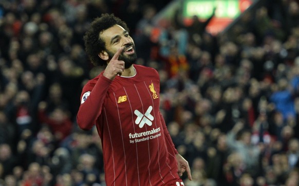epa07954445 LiverpoolÄôs Mohamed Salah celebrates after scoring the 2-1 goal during the English Premier League game between Liverpool FC and Tottenham Hotspur in Liverpool, Britain, 27 October 2019.  ...