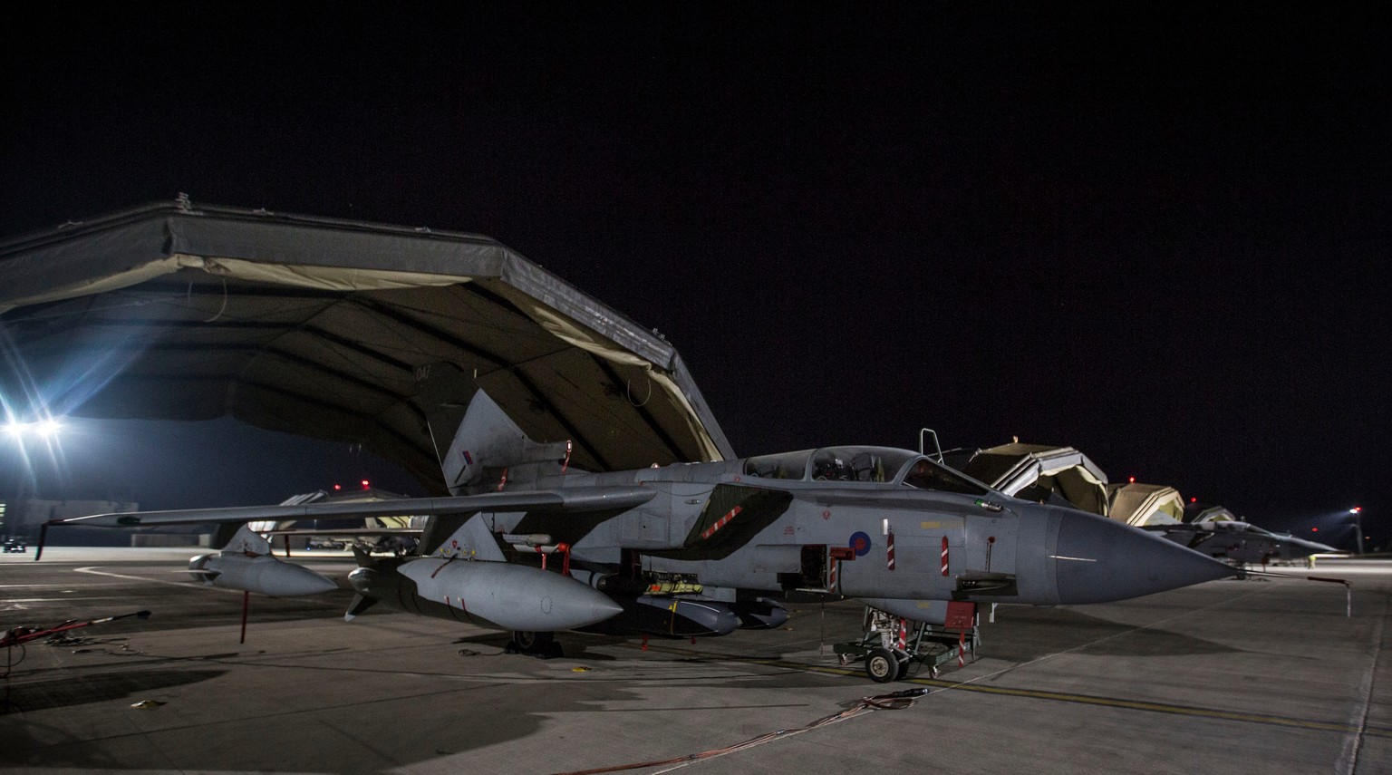In this image released by Britain&#039;s Ministry of Defense, RAF Tornado before taking off at Britain Royal Air Force base in Akrotiri, Cyprus, for its mission to conduct strikes in support of operat ...
