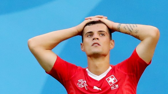 epaselect epa06861448 Granit Xhaka of Switzerland reacts after the FIFA World Cup 2018 round of 16 soccer match between Sweden and Switzerland in St.Petersburg, Russia, 03 July 2018.

(RESTRICTIONS  ...