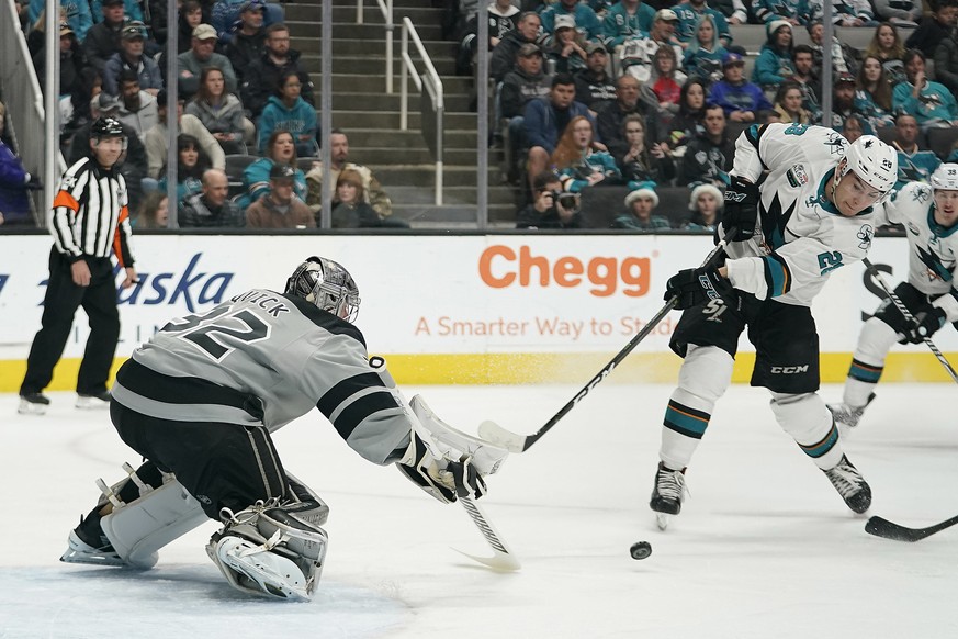 Los Angeles Kings goaltender Jonathan Quick (32) defends on a shot by San Jose Sharks right wing Timo Meier (28) during the first period of an NHL hockey game in San Jose, Calif., Saturday, Dec. 22, 2 ...
