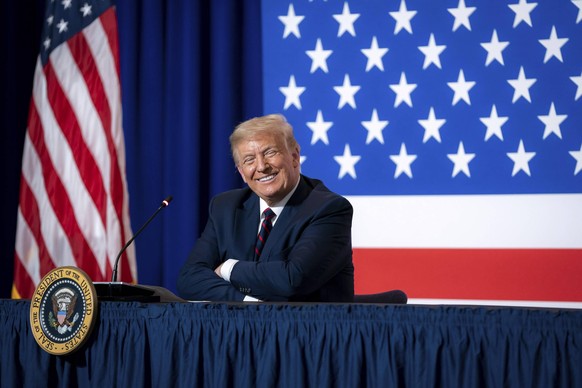 July 30, 2020, Washington, DC, United States of America: U.S. President Donald Trump smiles during a roundtable on donating plasma at the American Red Cross National Headquarters July 30, 2020 in Wash ...