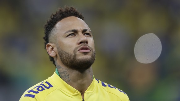 Brazil&#039;s Neymar sings the national anthem prior a friendly soccer match against Qatar at the Estadio Nacional in Brasilia, Brazil, Wednesday, June 5, 2019.(AP Photo/Andre Penner)
