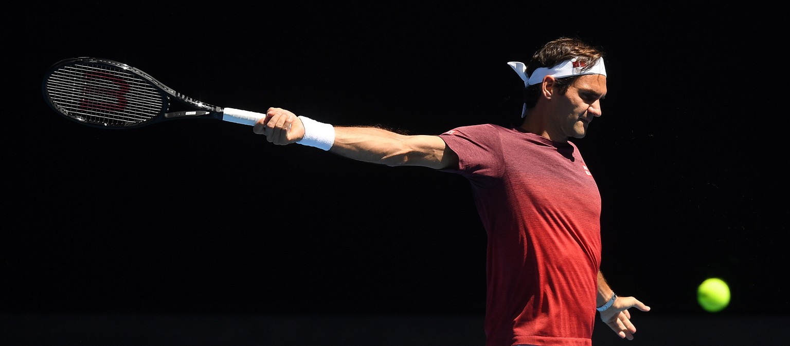 epa07279526 Roger Federer of Switzerland in action during a training session prior to the 2019 Australian Open tennis tournament in Melbourne, Australia, 13 January 2019. EPA/LUKAS COCH EDITORIAL USE  ...
