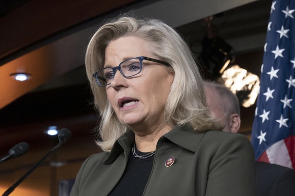 FILE - In this Dec. 17, 2019 file photo, Rep. Liz Cheney, R-Wyo., speaks with reporters at the Capitol in Washington. A deepening divide among Republicans over President Donald Trump&#039;s efforts to ...