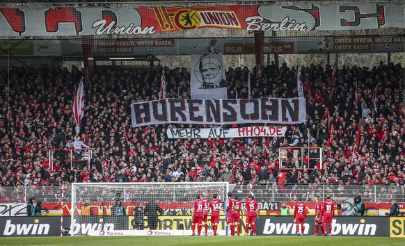 Union fans on the tribune display a banner reading &quot;Son of a bitch&quot; against TSG Hoffenheim club patron Dietmar Hopp during the German Bundesliga soccer match between 1. FC Union Berlin and V ...