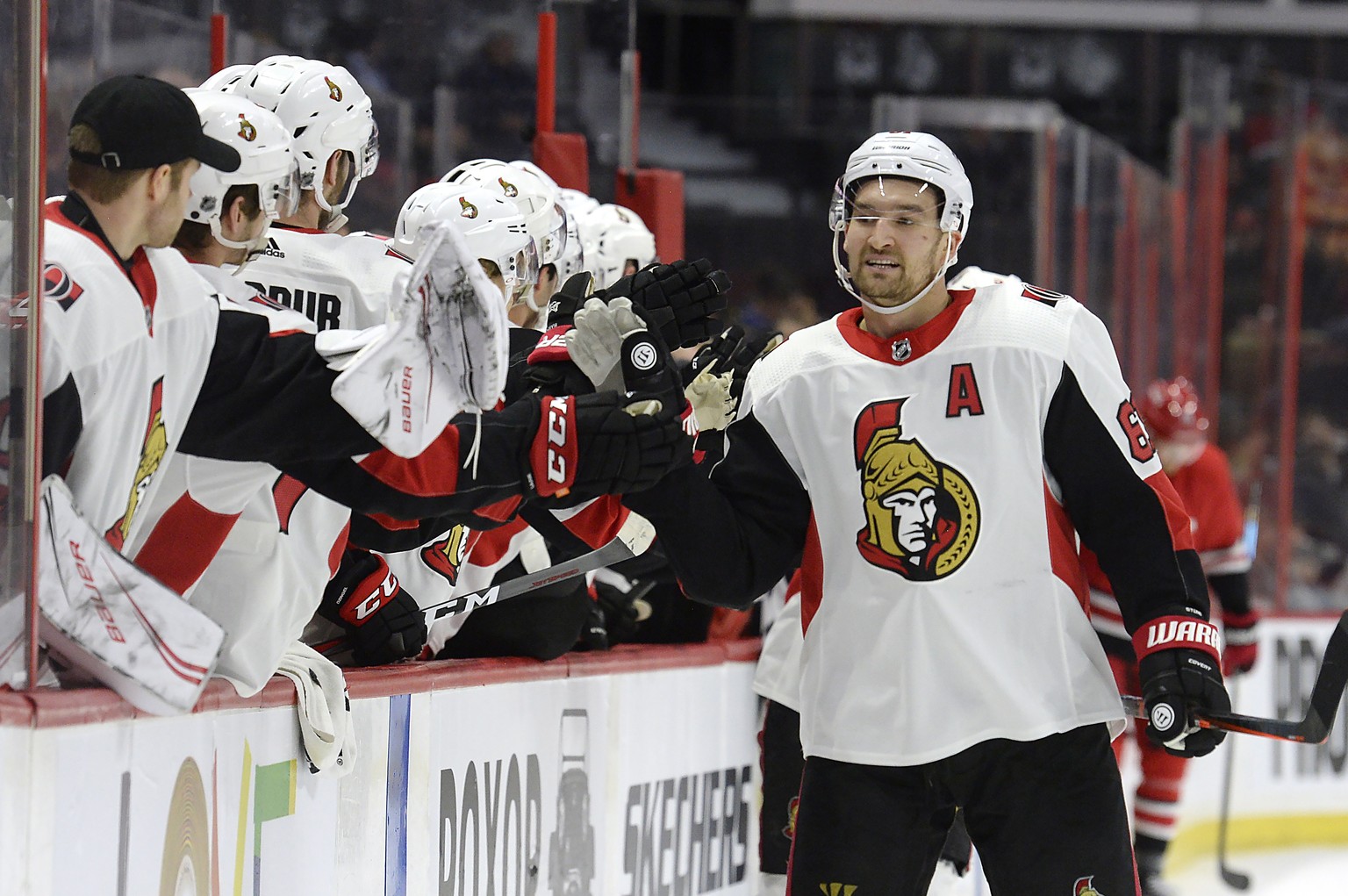 Ottawa Senators right wing Mark Stone (61) celebrates with players on the bench after scoring against the Carolina Hurricanes during the first period of an NHL hockey game, Tuesday, Feb. 12, 2019, in  ...