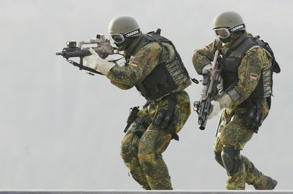 FILE - In this Feb. 5, 2004 file photo, soldiers of (KSK) Kommando Spezialkraefte, German Bundeswehr&#039;s special forces take part in a training exercise in Calw, southern Germany. Germany