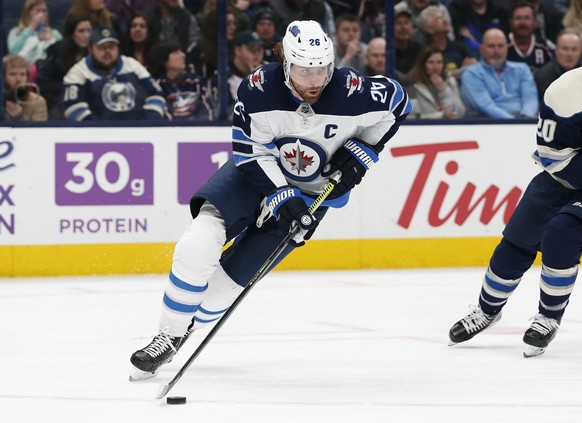 FILE - In this Jan. 22, 2020, file photo, Winnipeg Jets&#039; Blake Wheeler plays against the Columbus Blue Jackets during an NHL hockey game in Columbus, Ohio. Wheeler and the Winnipeg Jets would hav ...