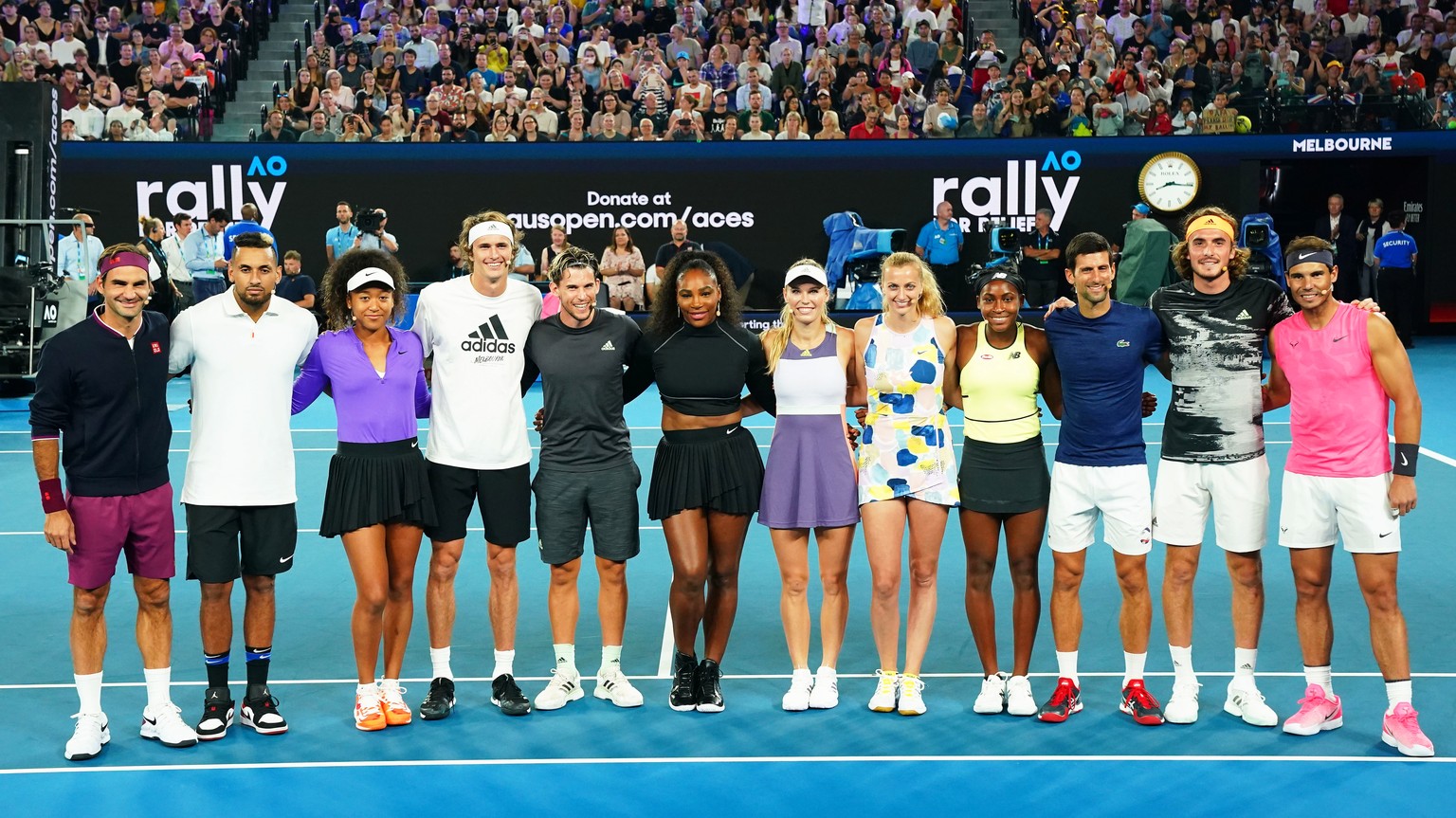 epa08129578 (L-R) Roger Federer of Switzerland, Nick Kyrgios of Australia, Naomi Osaka of Japan, Alexander Zverev of Germany, Dominic Thiem of Austria, Serena Williams of the USA, Caroline Wozniacki o ...