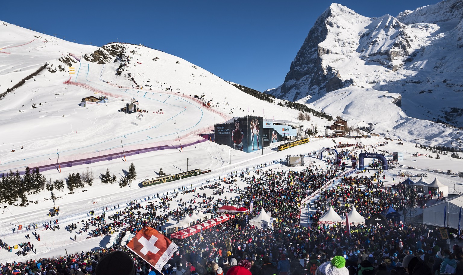 epa07300157 Spectators during the men&#039;s downhill race at the FIS Alpine Skiing World Cup in Wengen, Switzerland, 19 January 2019. On the right the Eiger mountain is seen. EPA/JEAN-CHRISTOPHE BOTT
