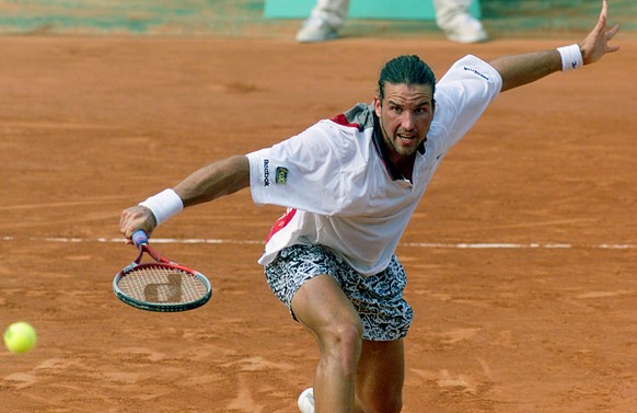 Third-seeded Patrick Rafter of Australia volleys to Fernando Meligeni of Brazil during their third round tennis match at the French Open at Roland Garros stadium in Paris Saturday, May 29, 1999. (AP P ...