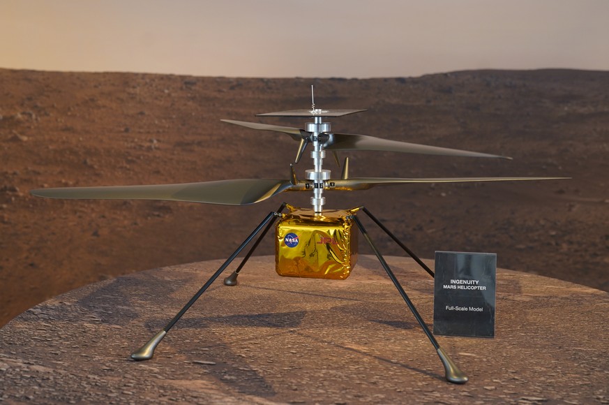 FILE - This Wednesday, Feb. 17, 2021 file photo shows a full-scale model of the Ingenuity helicopter displayed for the media at NASA&#039;s Jet Propulsion Laboratory in Pasadena, Calif. The 4-pound (1 ...