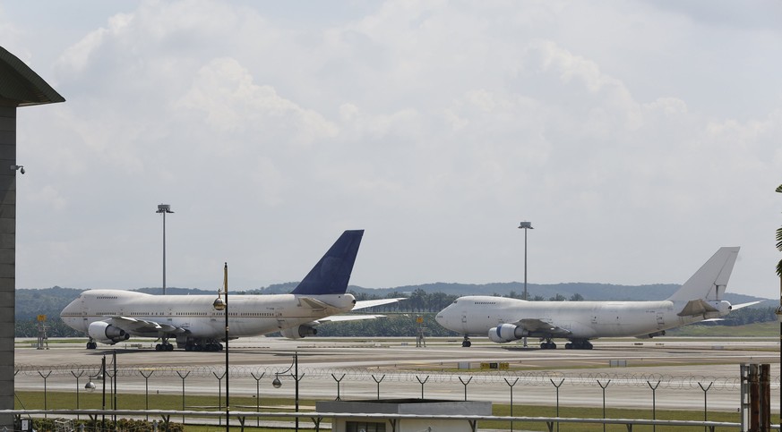 Two of three abandoned Boeing 747-200F planes are seen parked on the tarmac at Kuala Lumpur International Airport in Sepang, Malaysia, December 10, 2015. Malaysia&#039;s airport operator took out news ...