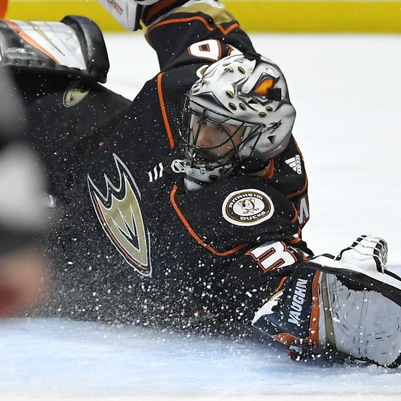 Anaheim Ducks goaltender Ryan Miller stops a shot during the first period of the team&#039;s NHL hockey game against the Washington Capitals on Friday, Dec. 6, 2019, in Anaheim, Calif. (AP Photo/Mark  ...