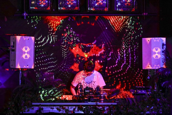 epa08486470 DJ Kritzkom plays during a live online streaming set at the Christa Kupfer nightclub in Berlin, Germany, 09 June 2020 (issued 15 June 2020). From 13 March 2020 on, all of Berlin&#039;s nig ...