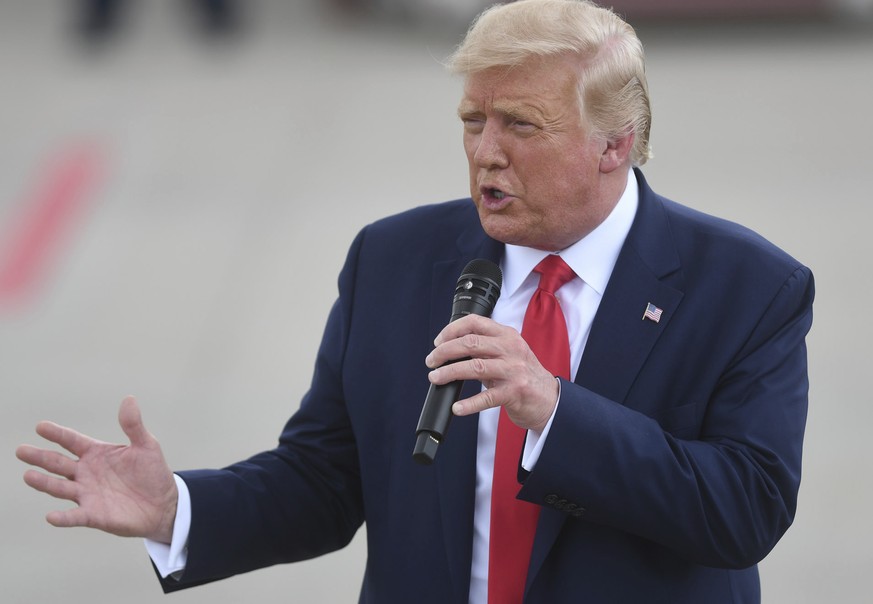 President Donald Trump talks to the crowd at the Wilmington International Airport in Wilmington, N.C., Wednesday, Sept. 2, 2020. Trump was visiting Wilmington to declare it the first World War II Heri ...