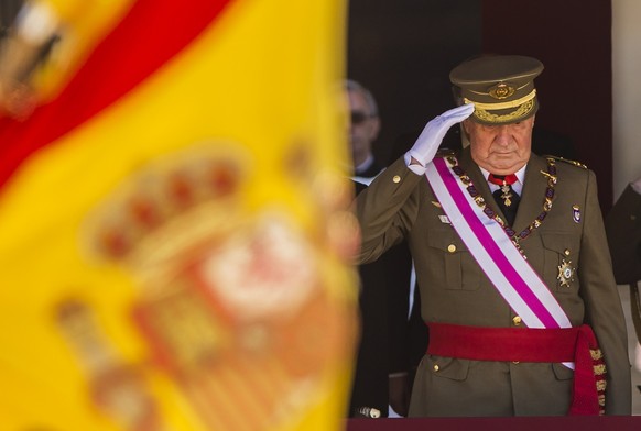 FILE - In this June 3, 2014 file photo then King Juan Carlos attends a military ceremony in San Lorenzo de El Escorial, outside Madrid, Spain. The royal family&#039;s website on Monday Aug. 3, 2020, p ...