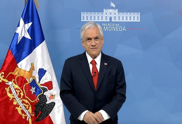 epa08688822 A handout photo made available by the Presidency of Chile shows Chilean President Sebastian Piñera during his virtual intervention at the 75th General Assembly of the United Nations, in Sa ...