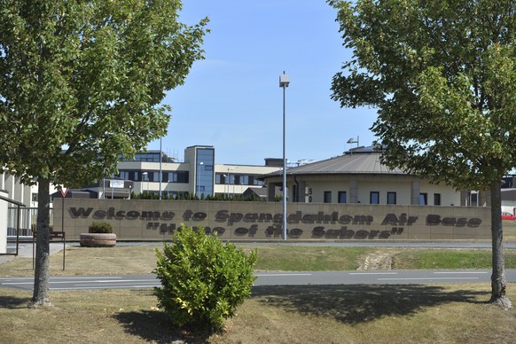 &quot;Welcome to Spangdahlem Air Base Home of the Sabers&#039; written on a wall near the main entrance of the US military airport in Spangdahlem, Germany, Thursday, July 30, 2020. Spurred on by Presi ...