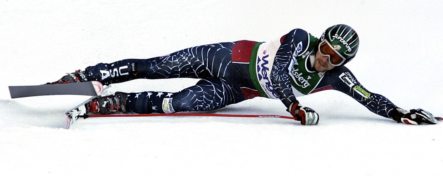 Bode Miller, of the United States, slides across the finish line on his way to win an Alpine Ski World cup men&#039;s downhill race in Wengen, Switzerland, Saturday, Jan. 13, 2007. (KEYSTONE/AP Photo/ ...