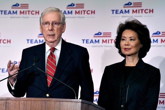 Senate Majority Leader Mitch McConnell, R-Ky., left, and his wife, Transportation Secretary Elaine Chao respond to a reporter&#039;s question during a press conference in Louisville, Ky., Wednesday, N ...