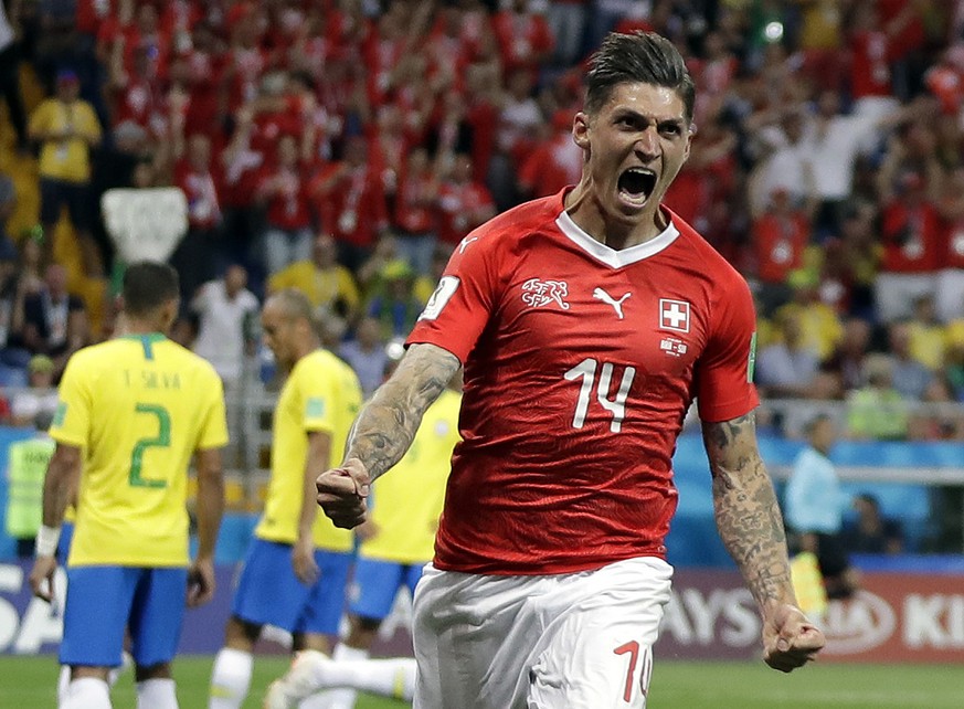 Switzerland&#039;s Steven Zuber celebrates after scoring his side&#039;s opening goal during the group E match between Brazil and Switzerland at the 2018 soccer World Cup in the Rostov Arena in Rostov ...