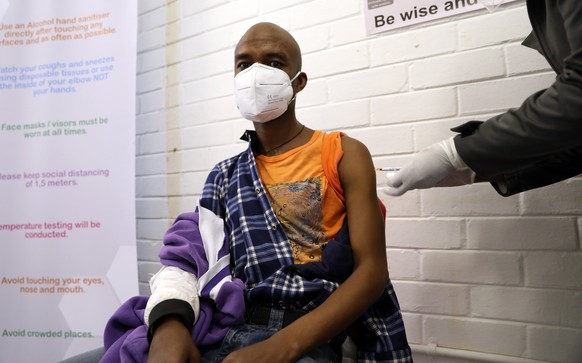 epa08505898 One of the first South African vaccine trialists gets injected during the clinical trial for a potential vaccine against the Covid-19 Corona virus at the Baragwanath hospital in Soweto, So ...